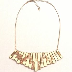 Gold dagger necklace