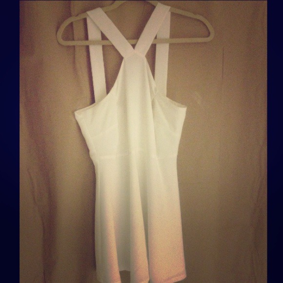 White halter top-like, short length dress.
