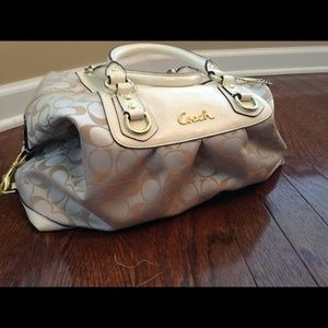 Cream colored coach handbag