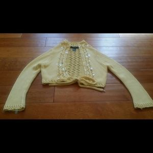 Arden b shrug sweater. Sequined detail.