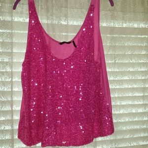 Hot pink sparkly top and black exercise pants