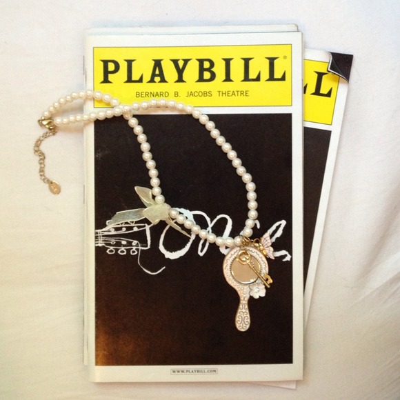 faux pearl necklace with golden charms