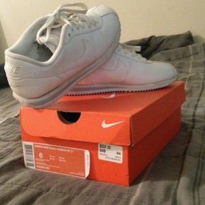 Black jordans and white nikes