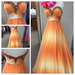 Two tone dress with a beaded sweetheart.