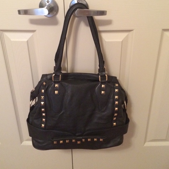 Black leather shoulder bag with studs