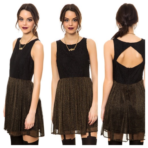 Jack Bb Dakota
Black Lace And Lurex Mesh Dress