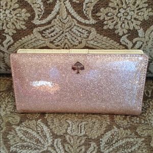 Glitter bug Kate Spade wallet in rose gold