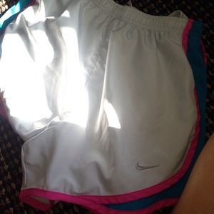 White and blue/pink nike running shorts