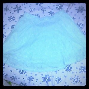 A teal lace skater skirt