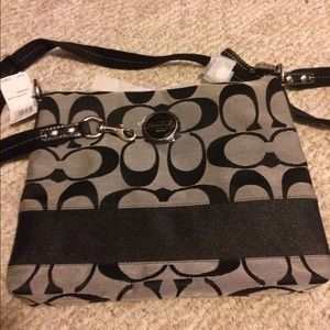Brand new grey and black Coach purse.