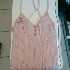 Cute sleeveless top with ruffles in pale pink