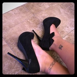 Black heels with black bow tie