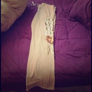 White Victorias Secret sweatpants.