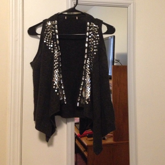Grey rhinestone sweater vest.