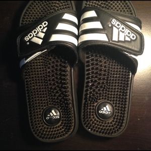 Adidas slip ons.