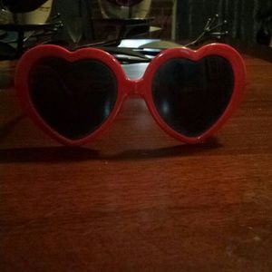 Heart shaped sunglasses with pentagrams