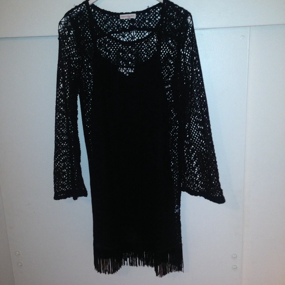 Cute knitted dress with fringe