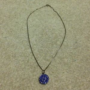 Silver necklace with blue pendant