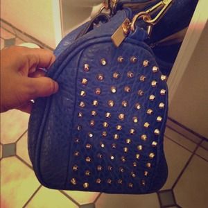 Blue with gold jewels bag.