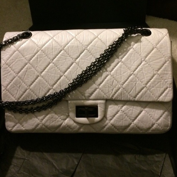 Pre-own  white Chanel purse