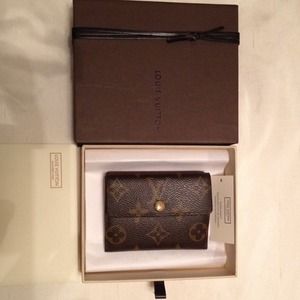 Authentic Louis Vuitton Ludlow Monogram Wallet
