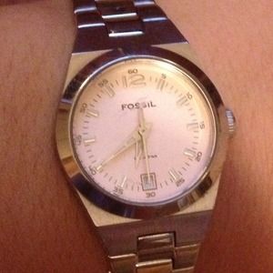 Fossil watch with pink face and date