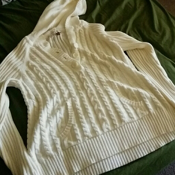 off white sweater with hood and pocket detail