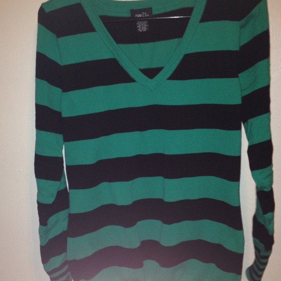 Green and black sweater.