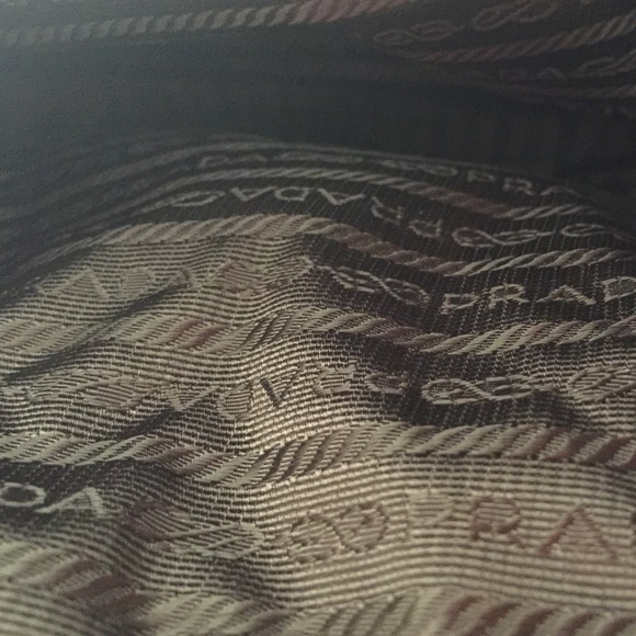 Inside of green Prada bag