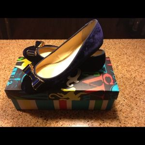 **Sold**C. Wonder Blue Velvet Crystal Bow Flat