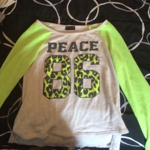 A raglan shirt from free kisses.