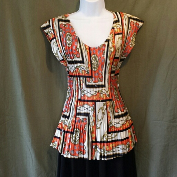orange and black top, navy white top, brown top.