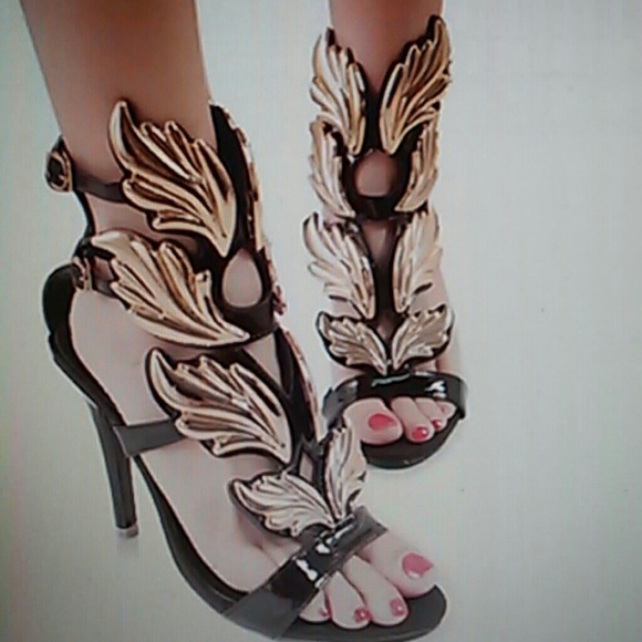 Brand new gold and black high heel