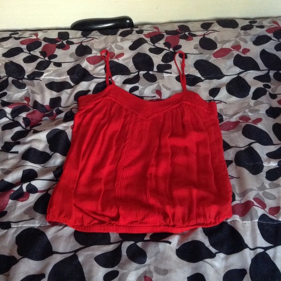 I am selling a red tank top with a v-neck
