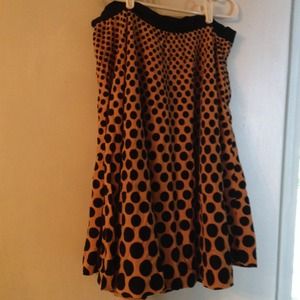 Free People corduroy skirt with black polka dots.