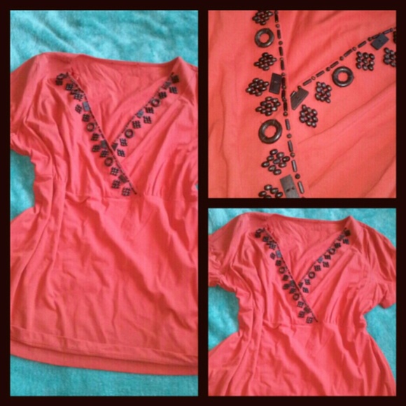 Besutiful orange bluse today 90%desc.