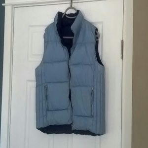 Light blue and dark blue reversible puffy vest
