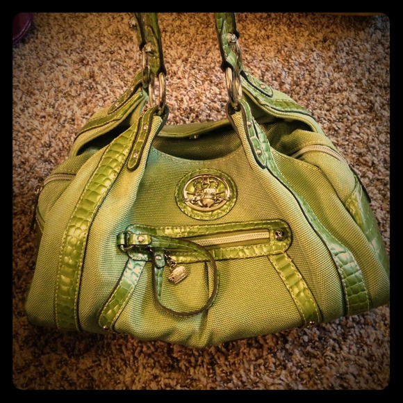 Kathy Van Zeeland green purse