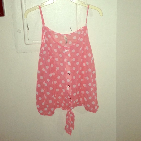 Pink and white polka dot tank top.