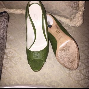SOLD...authentic Gucci army green peep toe pumps