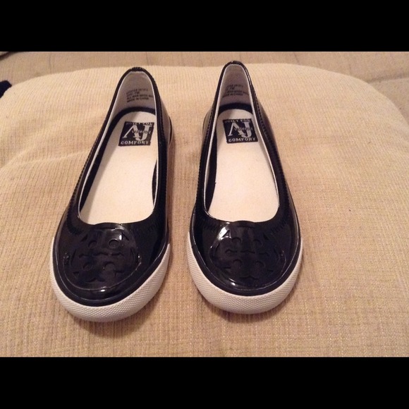 Black patent leather ladies slip on sneakers