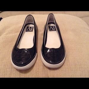 Black patent leather ladies slip on sneakers