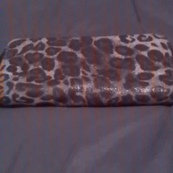 Blue and black leopard clutch