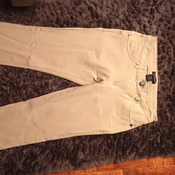 Khaki colored stretch/spandex jeggings.