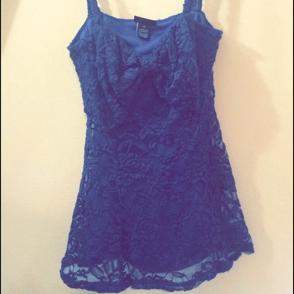 Brand new! Navy floral lace top. Never worn.