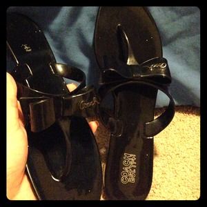 Black Coach.. A closet must have!!