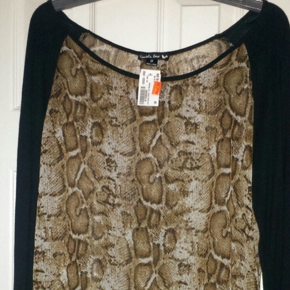 Long sleeve top says medium but to big will large