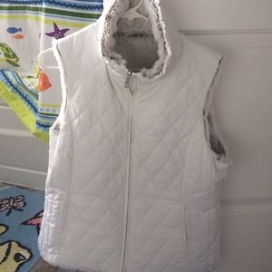 White with fur inside vest