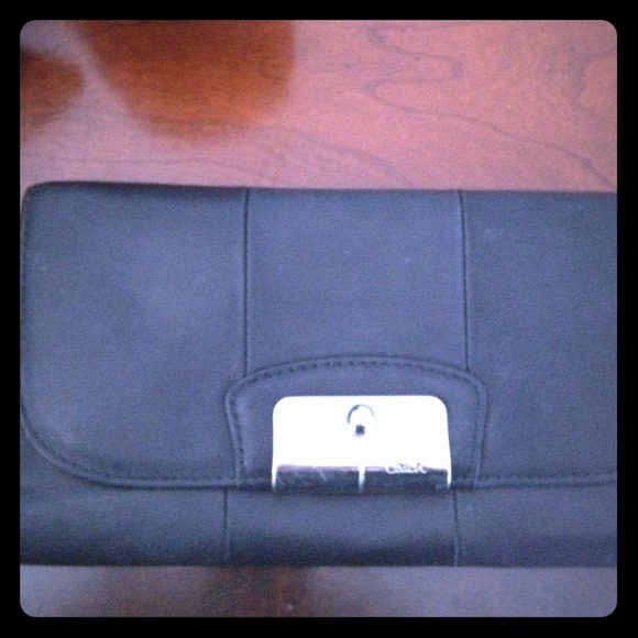 Coach tri-fold wallet with pink interior