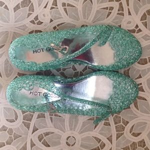 Green and silver jelly shoes